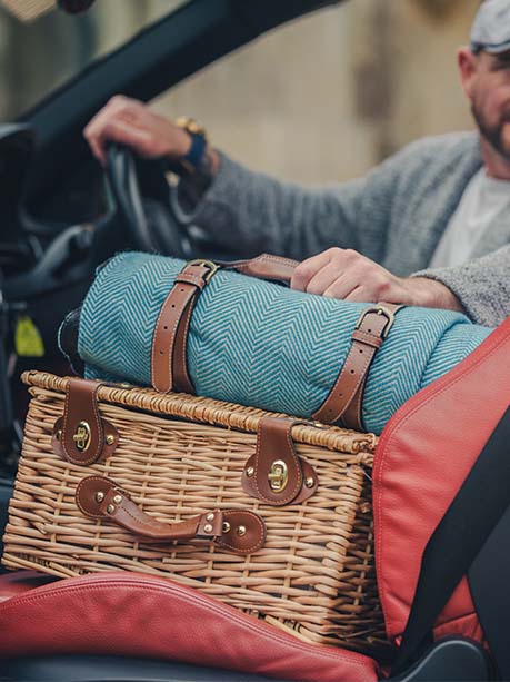 Heritage picnic blanket and Salisbury hamper on car seat